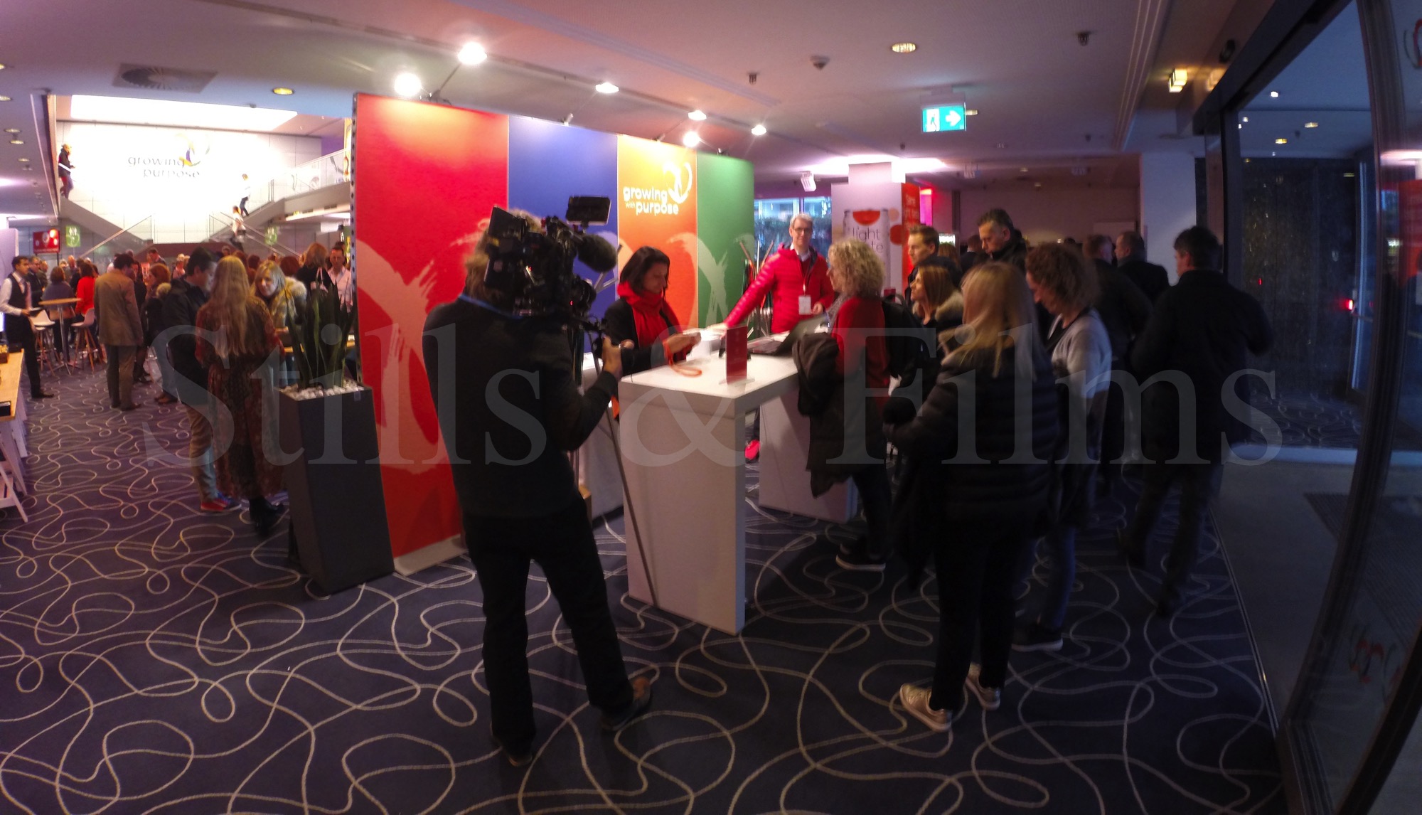 Participants lining up for accreditation at the  Coca Cola's All Hands Meeting 4 in Munich, Germany 7