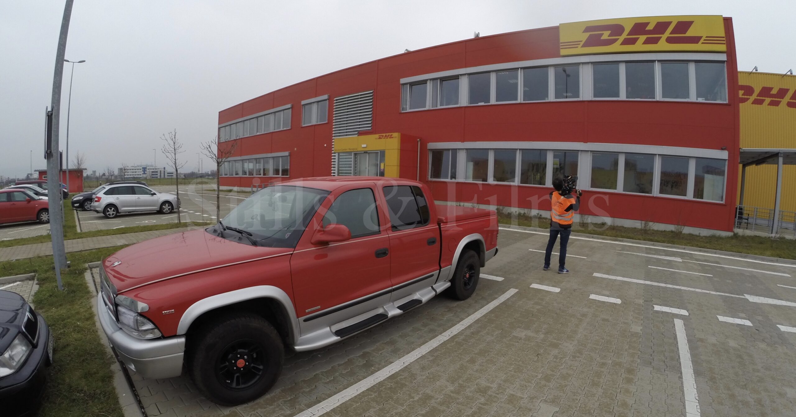 Our lil' red truck nicely blends in with our client's colour.